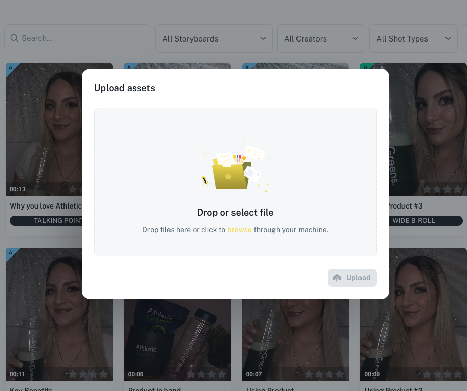Upload interface with drag-and-drop functionality for adding custom brand assets and footage to the clip library
